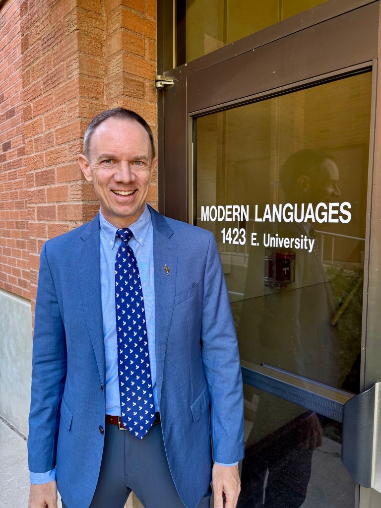 Lance in front of the University of Arizona College of Humanities Modern Languages department