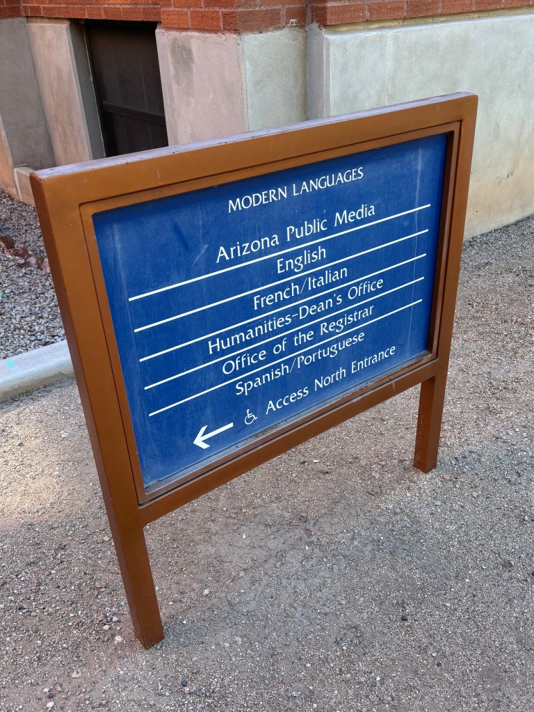 Sign outside the building for University of Arizona College of Humanities Modern Languages department